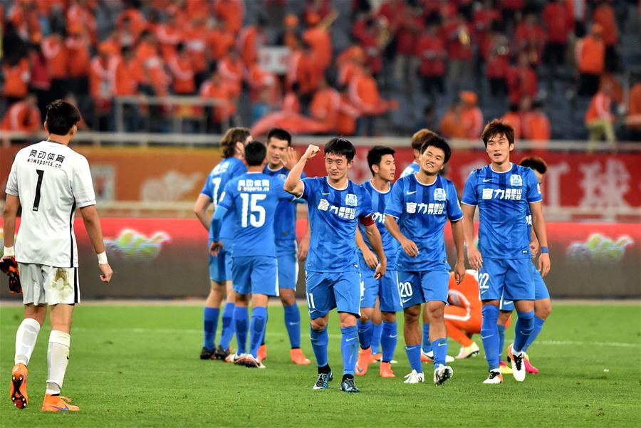 九州体育-青岛黄海对阵山东鲁能，谁能获得宝贵的三分？